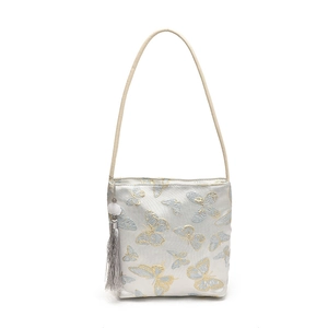 Embroidered butterfly bucket bag with grey tassels and chic contrasting shoulder straps