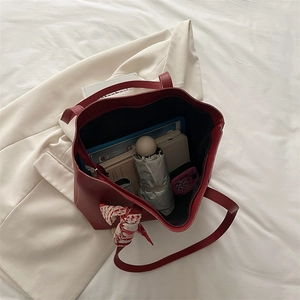 Red vintage large tote bag with decorative scarf and spacious interior for daily essentials