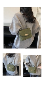 Detail view of a green quilted crossbody bag featuring a golden twist-lock and chain strap