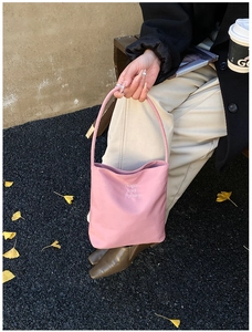 Pink matte tote bag with Hope and future embroidery shown in a natural outdoor setting