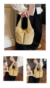 Vue détaillée du sac fourre-tout en nylon kaki avec plusieurs poches pour le quotidien