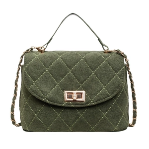 Elegant dark green quilted crossbody bag with gold twist lock and chain strap