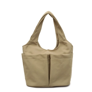 Sac fourre-tout minimaliste en nylon kaki avec poches frontales et surpiqûres blanches