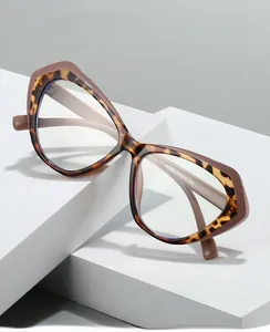 Detail of tortoise and pink cat-eye glasses frame with TR90 material and modern design