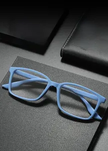 Detail view of light blue reading glasses frame with size specs 6819 engraved on temple