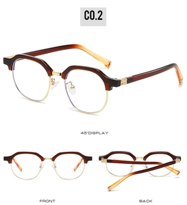 Detailed views of irregular browline glasses with amber frames and metal rims