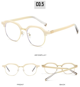 Detail view of cream browline glasses showing the gold metal rim and gradient temples