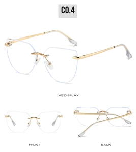 Detail view of pink-gold rimless cat-eye glasses frame with 45-degree angle display
