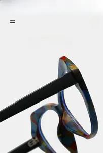 Detailed view of lightweight TR90 cat-eye frame with elastic geometric color-block pattern