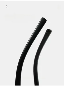 Detail of curved black glossy glasses temple showing comfortable ergonomic design