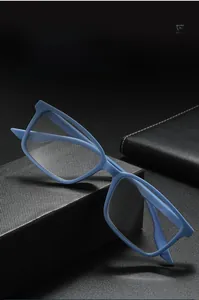 Detail of matte blue glasses frame showing 90% light transmittance resin lens specifications