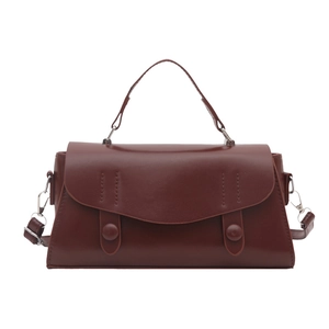 Retro deep brown leather handbag with top handle and detachable shoulder strap in front view