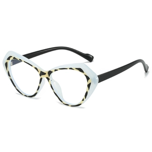 Cat eye blue light blocking glasses with blue translucent frame and tortoiseshell inner pattern