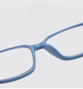 Detail view of comfortable integrated nose pads on lightweight blue reading glasses