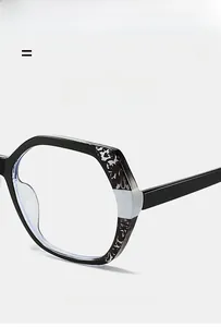 Detail of TR90 rectangular glasses frame showing silver hinge hardware and texture