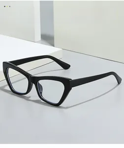 Detail of stylish black cat-eye glasses frame with textured material on white block