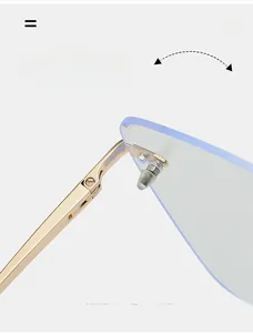 Detail of durable gold metal hinge on rimless glasses with light blue lenses