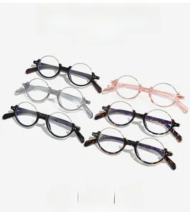 Macro detail of retro round semi-rimless anti-blue light glasses in six stylish colors