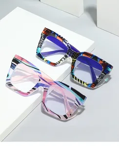 Detail of oversized square anti-blue light glasses with colorful abstract pattern frame