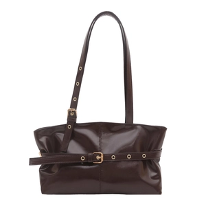 Glossy dark brown oil wax leather tote bag with long shoulder strap and gold buckle
