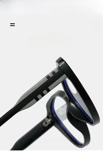 Detail of cat eye glasses showing checkered pattern temples and metal hinge decor
