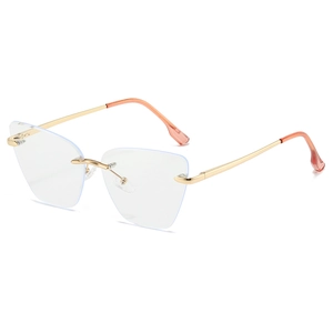 Lightweight rimless cat-eye glasses with gold metal accents and blue light coating