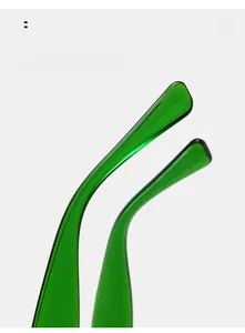 Detail view of transparent green curved mirror legs showing the ergonomic temple design