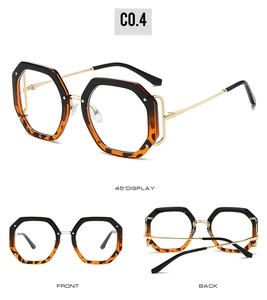 Detailansicht der polygonalen Blaulichtfilter-Brille mit hohlen Seiten und Goldbügeln