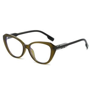 Modern two-tone cat eye glasses with olive green frame and black temples shown at 45-degree angle