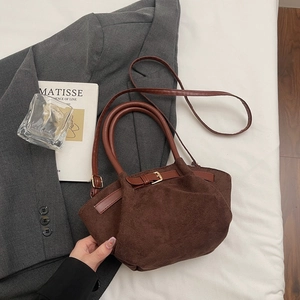 Retro brown suede crossbody bag with crescent shape and stylish dual handles