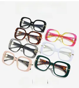Detailed overhead view of oversized square sunglasses in seven assorted fashion colors