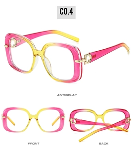 Detail view of square gradient pink and yellow sunglasses with gold metal hinges