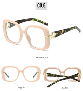 Detailed views of square pink frames with tortoiseshell temples and gold G-decor