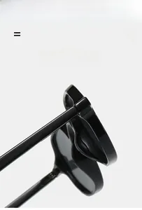 Detail of the high-quality durable hinge on lightweight black glossy eyeglasses frame
