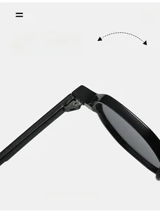Detail of durable reinforced metal hinge on black full-frame stylish cycling sunglasses