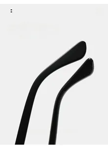 Detail showing ergonomic curved eyeglass temples with anti-slip texture on black PC frame
