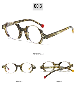 Detailed view of leopard print irregular glasses frame with red and yellow ball tips