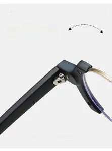 Close-up of durable metal hinges on black and gold color block irregular glasses