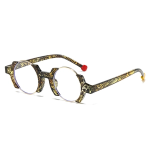 Asymmetric leopard print glasses with gold metal trim and colorful temple tips