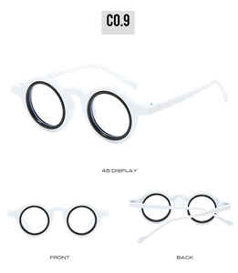 Detailed views of retro round glasses frame with black inner ring and white outer frame