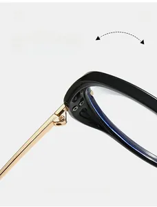 Macro shot of durable golden metal hinge on oversized black aviator sunglasses