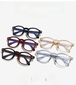 Detail of round vintage eyeglass frames in black, tortoiseshell and blue colors