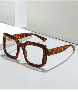 Close-up of tortoise shell pattern texture on square oversized eyeglass frames