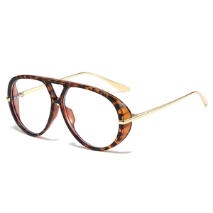 Oversized pilot aviator sunglasses with tortoise frame and gold metal temples in a 3/4 view