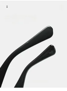 Close-up detail of ergonomic curved black glasses legs for comfortable wearing
