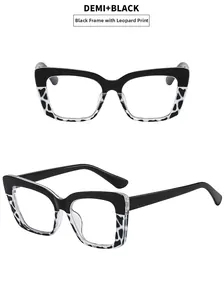 Detail view of cat-eye rectangle glasses frames in demi black with two angles