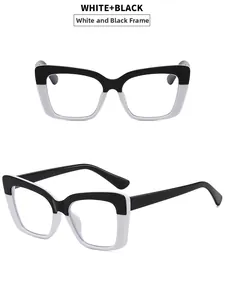 Detail view of cat eye glasses frames with white and black contrast color design