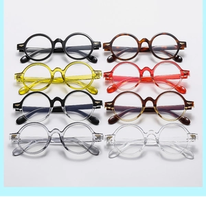Selection of eight retro oval chunky frame glasses in various colors and finishes