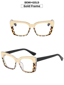 Detailed views of cat-eye frames featuring gold metal upper and tortoiseshell lower rims