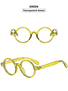 Macro view of transparent green oval round frame glasses with thick retro design